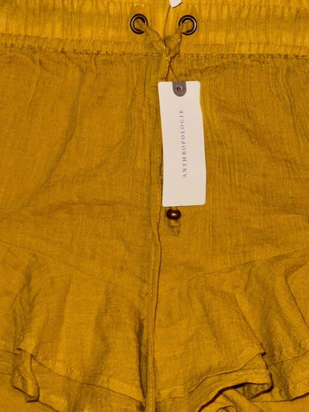 By Anthropologie Grommet Flounce Shorts